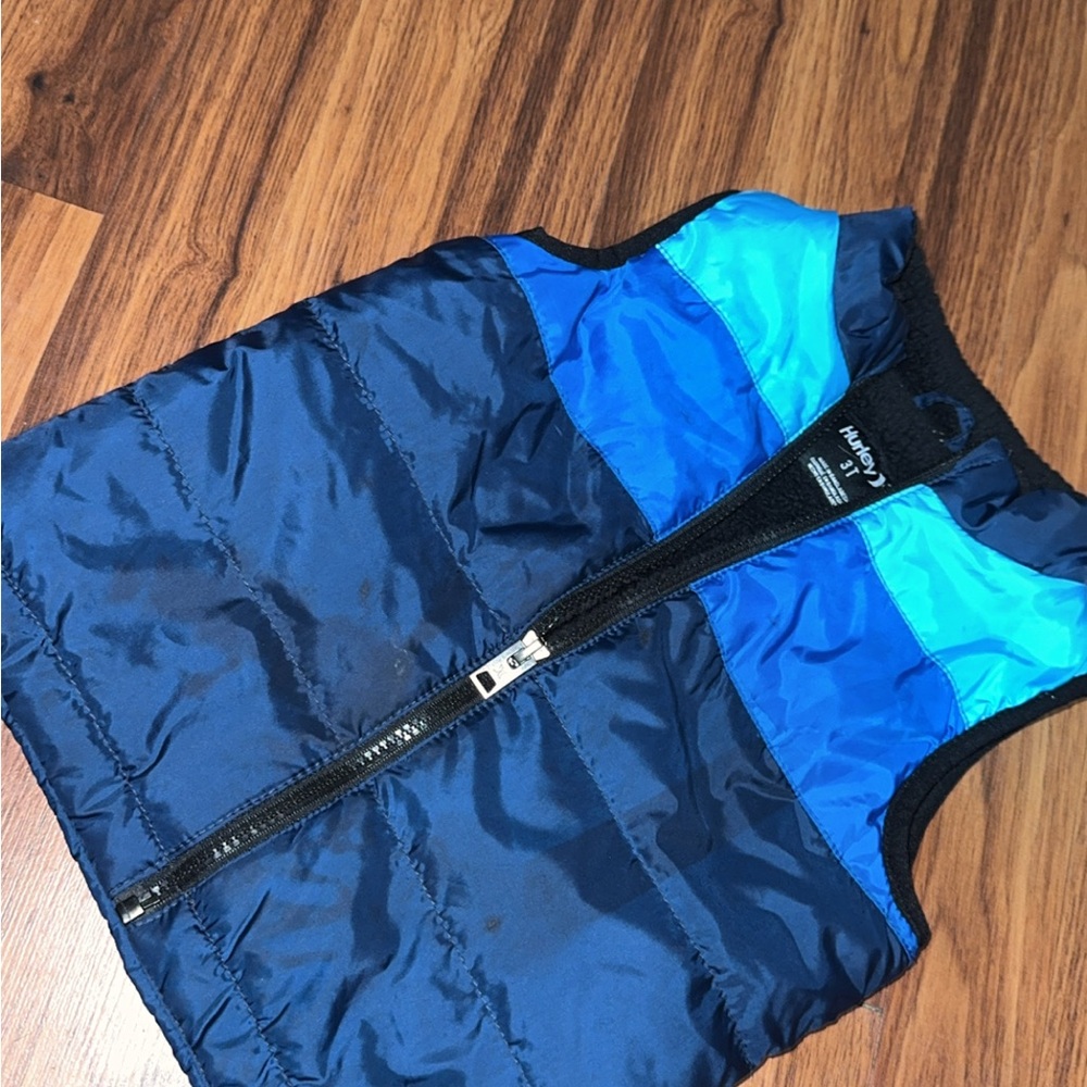 Blue and Black Puffer Vest